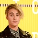 30.ago.2015 - Justin Bieber aparece de novo visual no Video Music Awards 2015. O cantor deixou maior a franja, que já foi sua marca registrada no início da carreira - Getty Images
