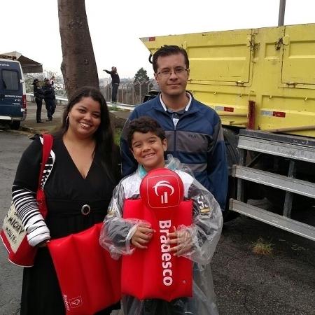 Claudia Nascimento, Robson Nascimento e o filho, Rafael Nascimento, 8, chegaram às 9h no Autódromo de Interlagos para a 3ª etapa da Old Stock Race e aproveitaram para curtir a programação da Viradinha Cultural - Renata Nogueira/UOL - Renata Nogueira/UOL