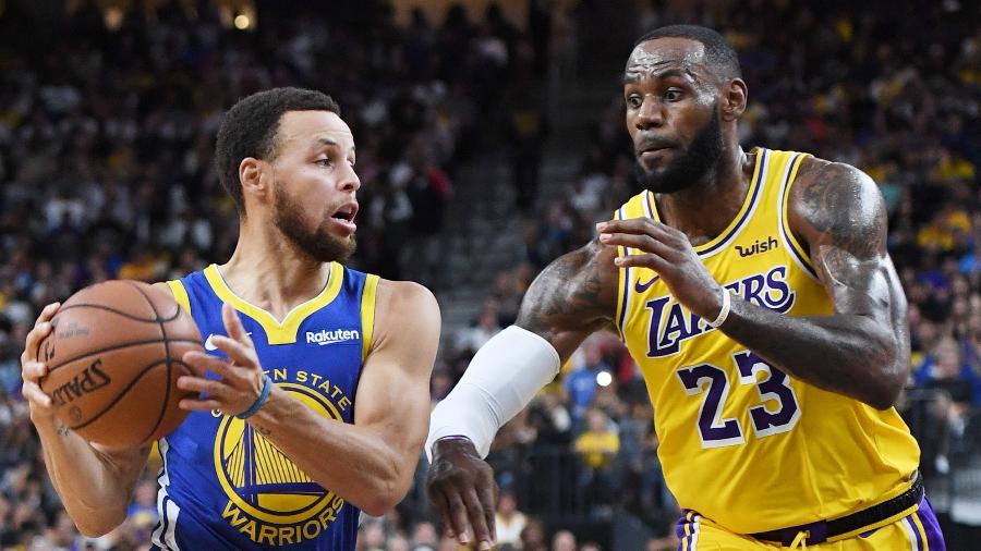 Stephen Curry e LeBron James em jogo da NBA -  Ethan Miller/Getty Images