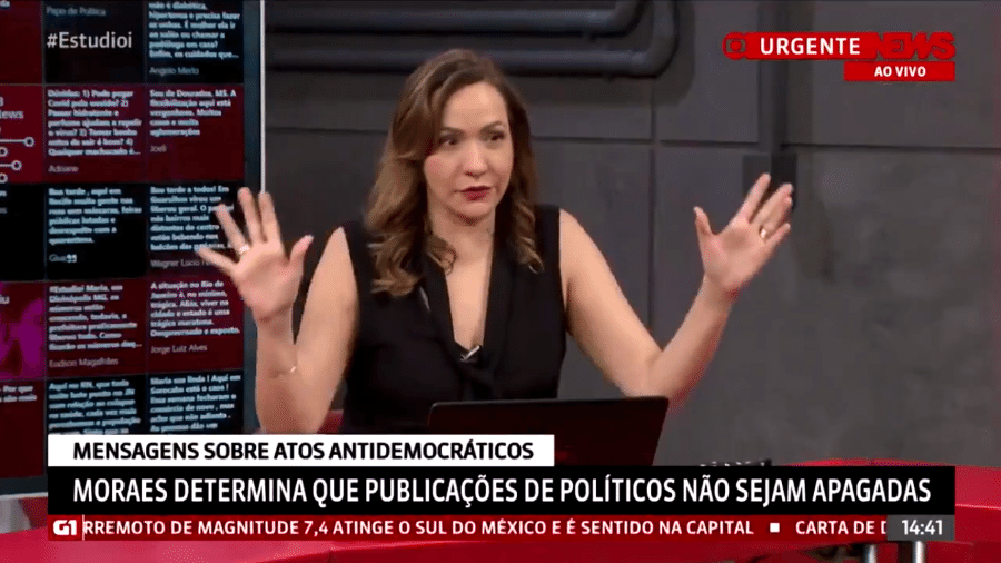 Maria Beltrão dá "bronca de professora" em Octavio Guedes, que mexia no celular enquanto a apresentadora falava sobre atos antidemocráticos - Reprodução/GloboNews