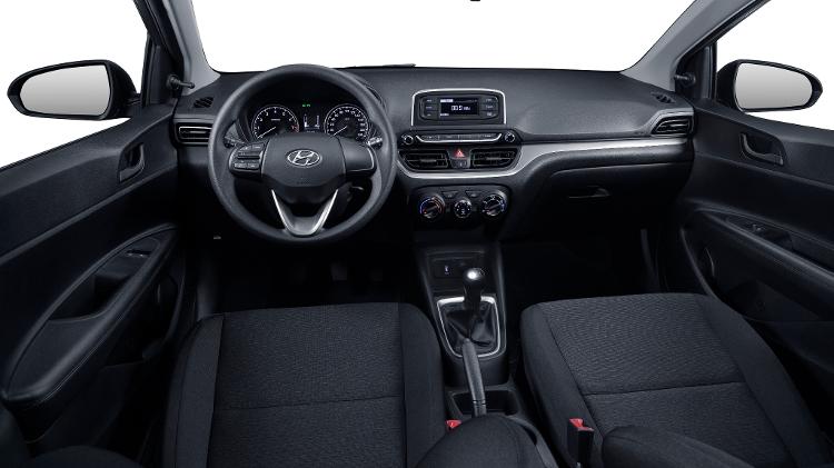 Cabin features predominantly black finish, with silver fabric detail; electric windows, front only - Press Release