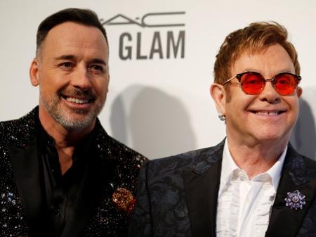 O casal David Furnish e Elton John - Brian Snyder/Reuters