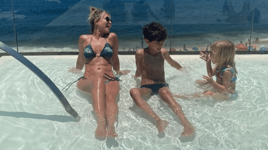 Eliana com os filhos em piscina de hotel no RJ: por que precisa ser tenso? - Reprodução Instagram