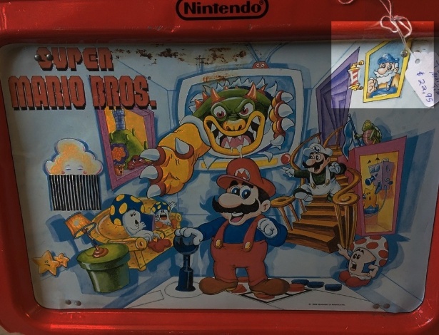 Quadro no canto da ilustração mostra personagem misterioso: até o momento, a Nintendo não se pronunciou sobre a questão - Reprodução