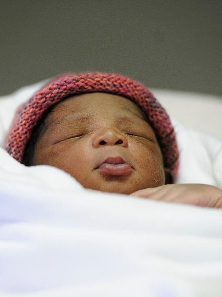 Bebê chamado Milagre nasceu a bordo de navio de imigrantes - Reuters/ Guglielmo Magiapane