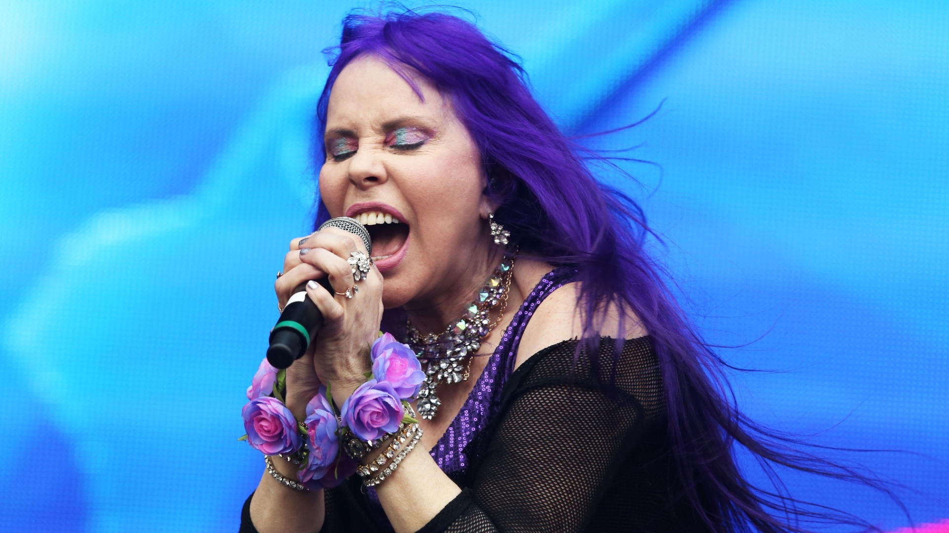 20.set.2015 - Baby do Brasil chamou Pepeu Gomes e seu filho, Pedro Baby, para tocarem juntos no palco Sunset, durante o terceiro dia do festival Rock in Rio 2015. - Marco Antônio Teixeira/UOL