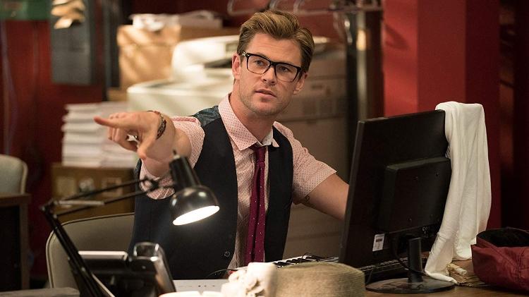 Chris Hemsworth em cena de "Caça-Fantasmas" (2016) - Divulgação/IMDb - Divulgação/IMDb