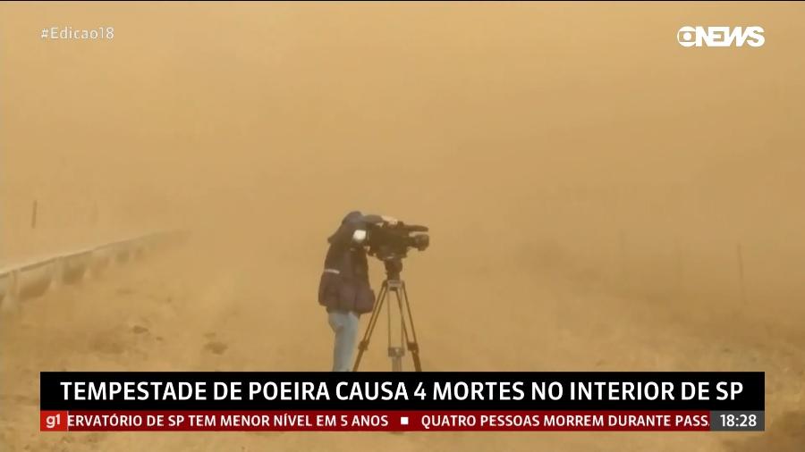 O cinegrafista Valdir Pietro foi surpreendido por chegada de nuvem de poeira - Reprodução/GloboNews