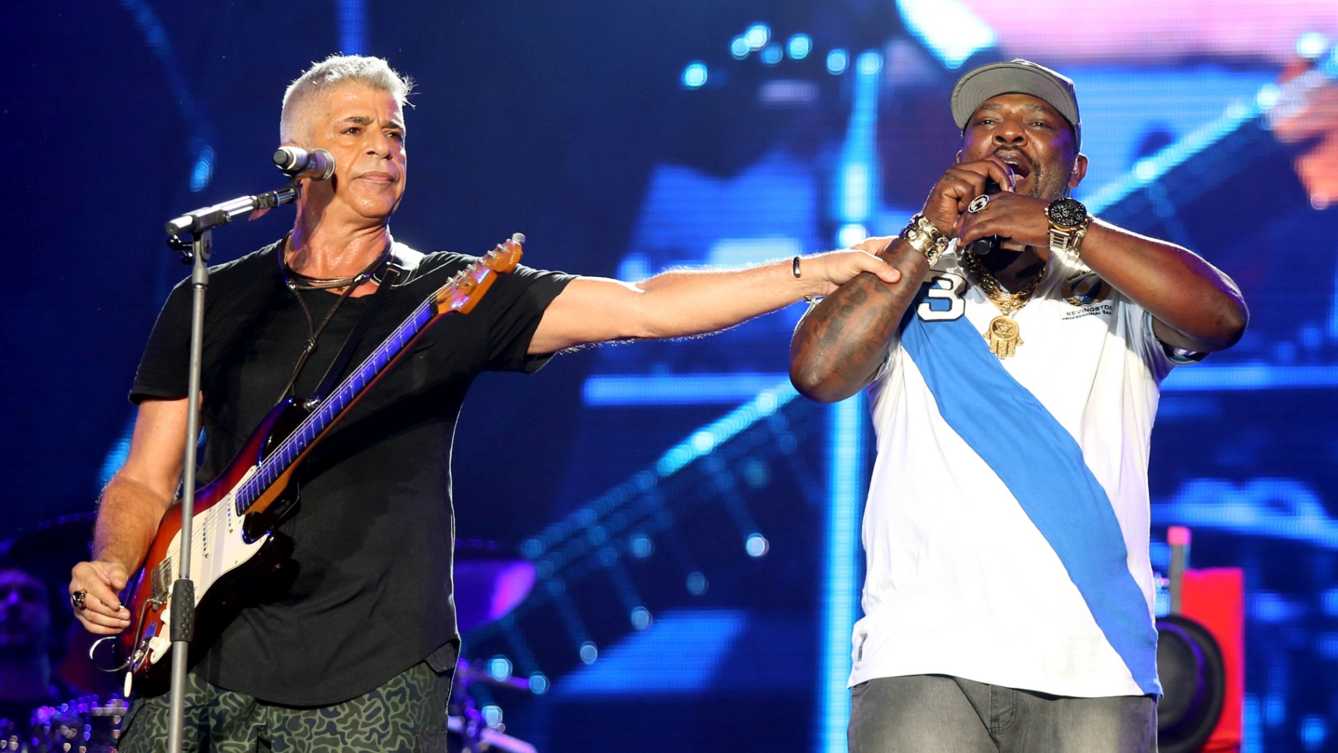 26.set.2015 - Lulu Santos canta com Mr. Catra no sexto dia do Rock in Rio 2015 - Fernando Maia/UOL