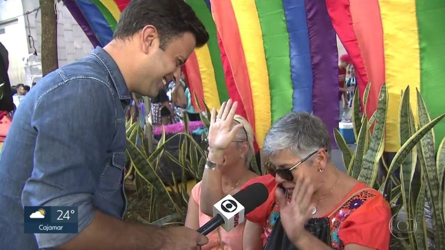 O repórter Marcelo Poli, da Globo, é paquerado na Parada LGBT - Reprodução/TV Globo