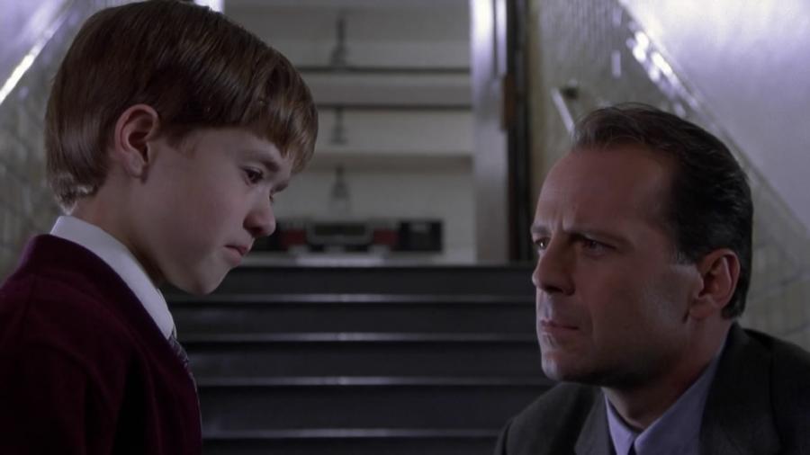 Bruce Willis e Haley Joel Osment em "O Sexto Sentido" (1999) - Divulgação