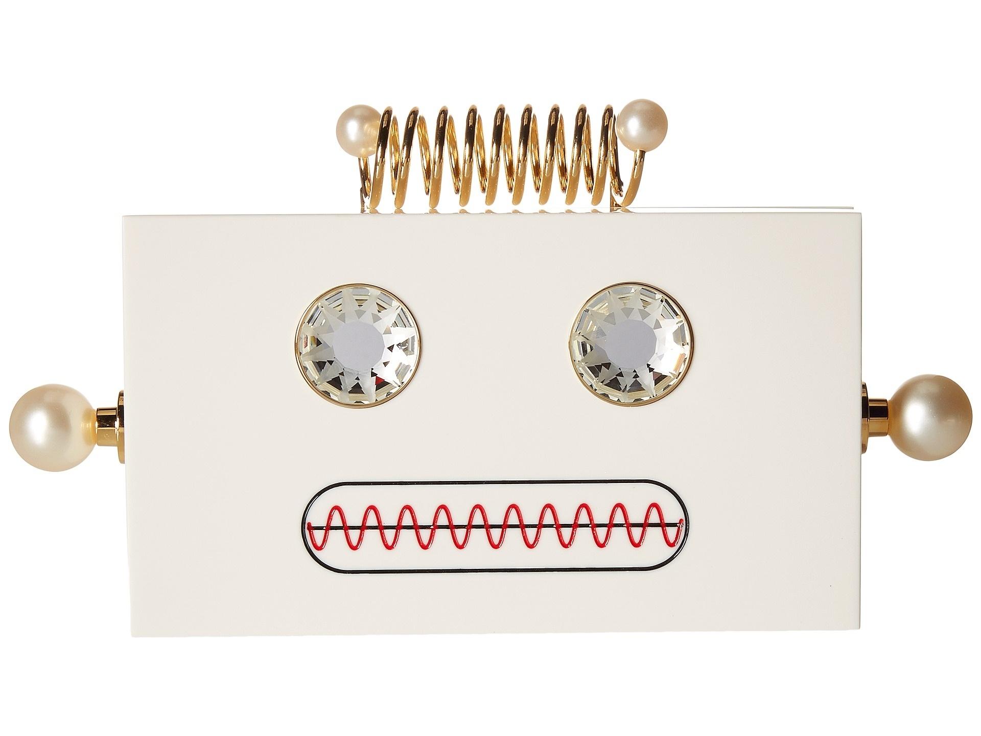 Um simpático robozinho pode deixar o look de festa mais divertido: da Charlotte Olympia (us.charlotteolympia.com), a clutch feita de acrílico conta com detalhes em cristais Swarovski e pérolas e está em promoção no site da marca, com 50% de desconto: US$ 687 ou cerca de R$ 2.200 (cotação do dia 30.dez.2016) - Divulgação