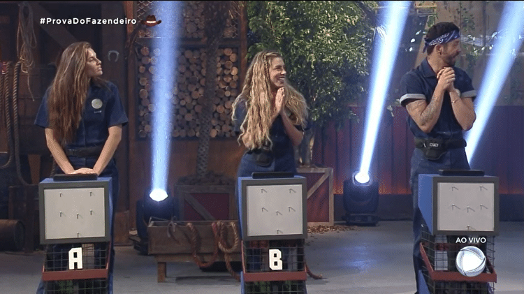 A Fazenda 2021: Dayane Mello, Erika Schneider e Rico Melquiades na quarta prova do fazendeiro - Reprodução/PlayPlus - Reprodução/PlayPlus