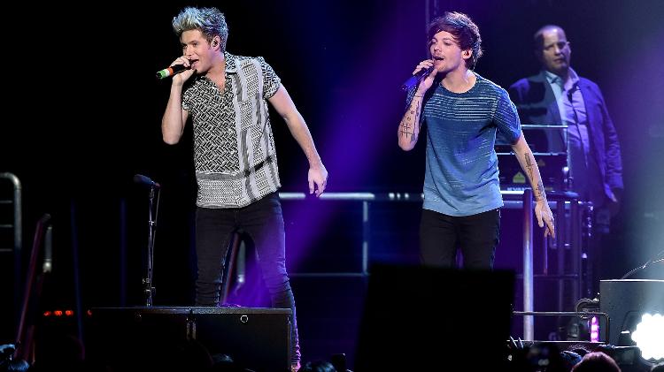 Niall Horan e Louis Tomlinson em show do One Direction, em 2015, em Los Angeles; boy band terminou no ano seguinte