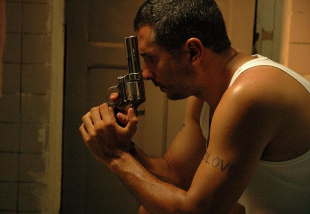 Cena de "Perro come perro" (2008) - Reprodução