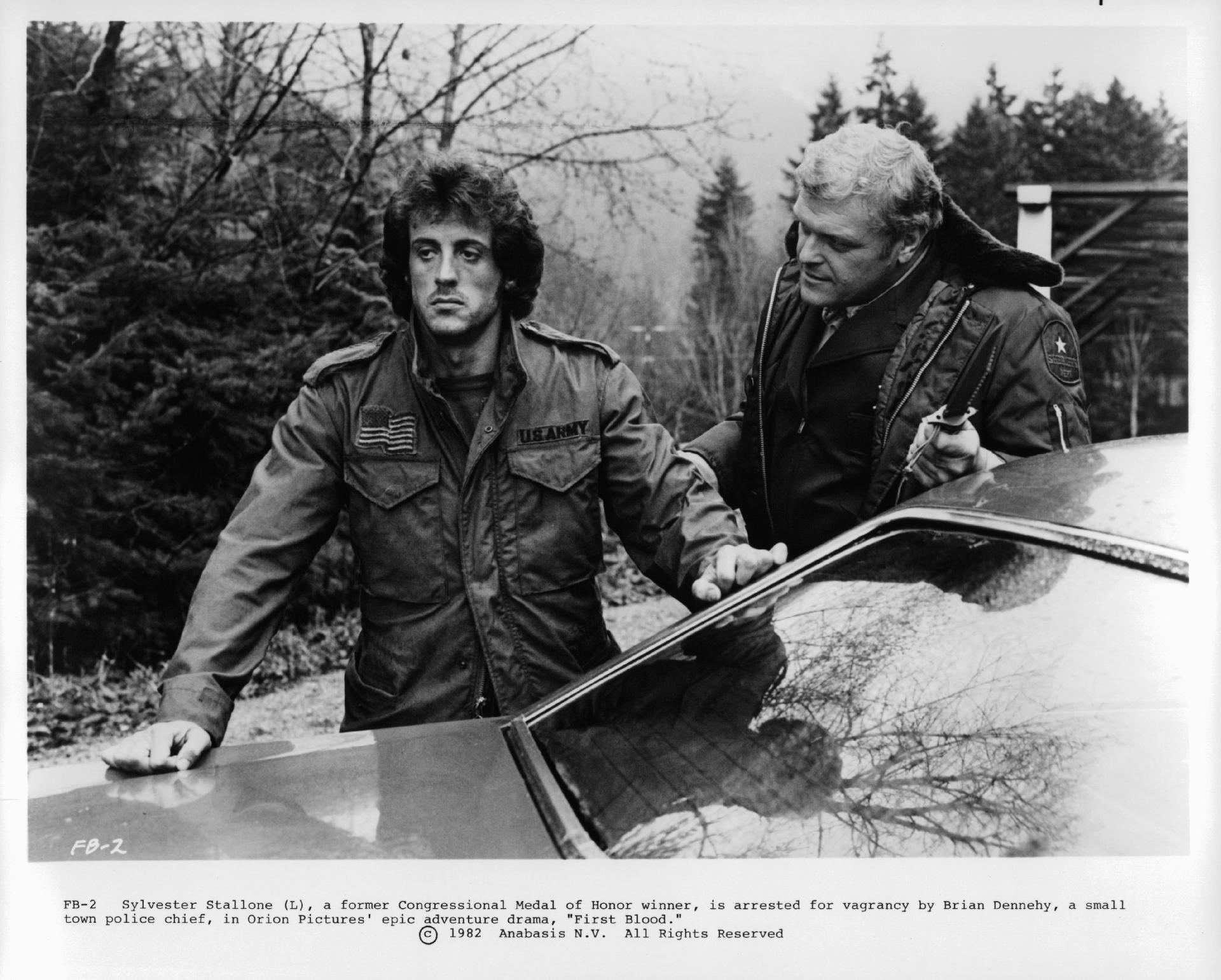 Sylvester Stallone is arrested for vagrancy by Brian Dennehy in a scene from the film 'First Blood', 1982. (Photo by Orion/Getty Images) - Michael Ochs Archives/Getty Images