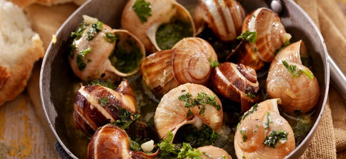 Escargots na manteiga com ervas - Getty Images