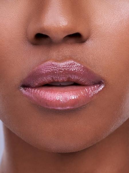 Lábios com gloss - Getty Images/iStockphoto