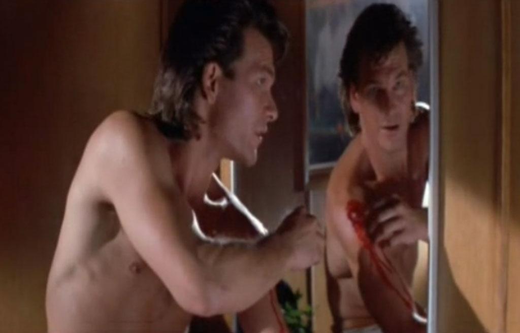 Patrick Swayze em cena de "Matador de Aluguel" (1989) - Reprodução