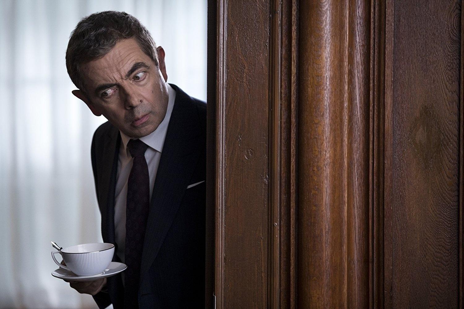 Rowan Atkinson em cena de "Johnny English 3" (2018) - Divulgação