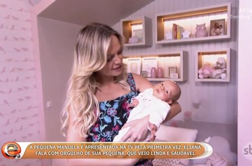 Eliana mostra a filha Manuela no retorno ao programa - Reprodução / SBT