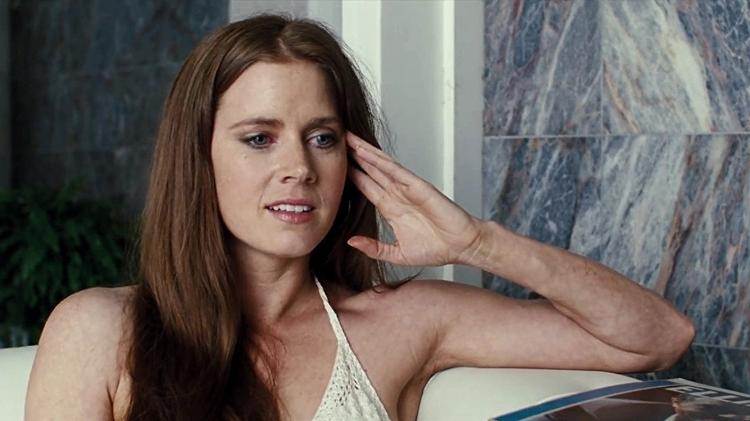 Amy Adams em cena em "Trapaça" (2013) Amy Adams em cena em "Trapaça" (2013)