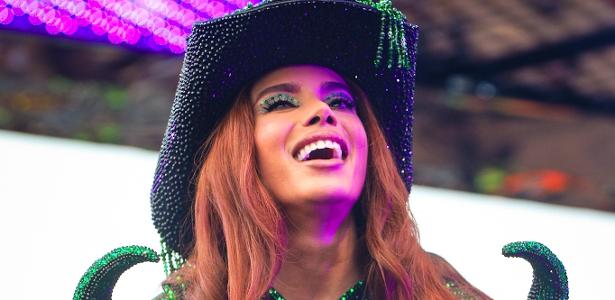 'Fazemos Zoom com ela': como é relação da Ambev, dona da Beats, com Anitta?