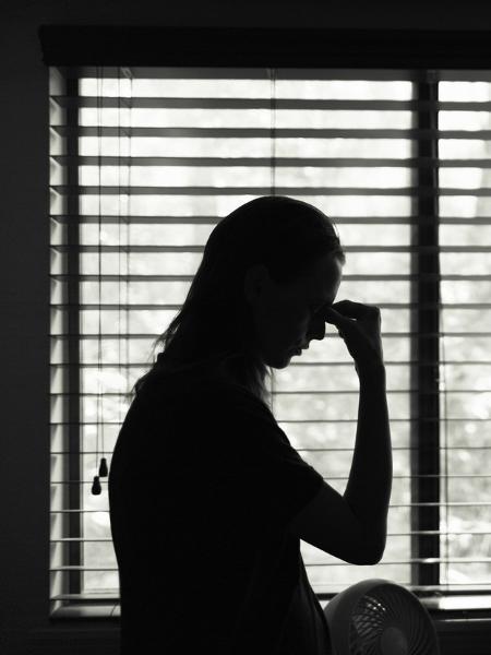 mulher vítima violência doméstica - Getty Images/iStockphoto