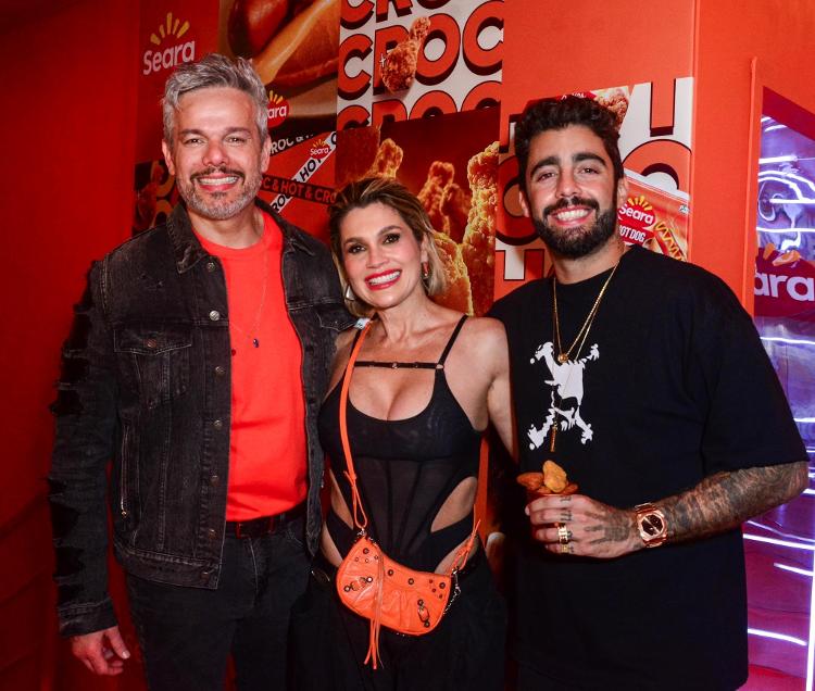 Otaviano Costa, Flávia Alessandra e Pedro Scooby no segundo dia de Rock in Rio 2024