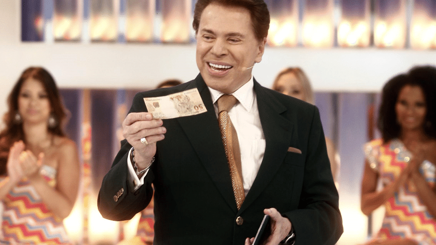 Silvio Santos distribui dinheiro em seu programa no SBT - Divulgação/SBT