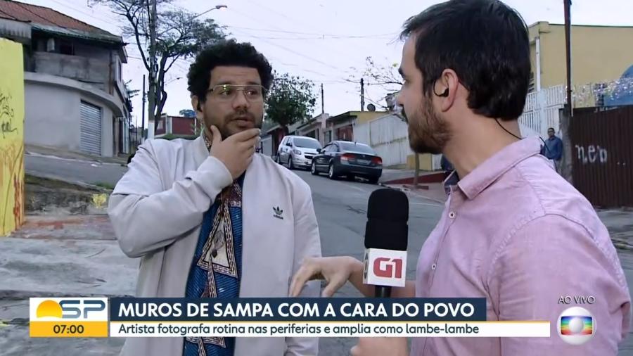 O artista de rua Cassimano Santos interrompe entrevista no "Bom Dia SP" para protestar contra Bolsonaro - Reprodução/Globo