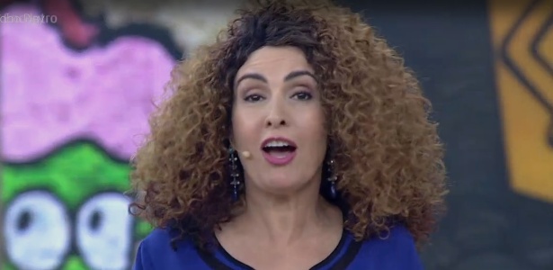 Fátima Bernardes com peruca de cabelos cacheados - Reprodução/Globo - Reprodução/Globo