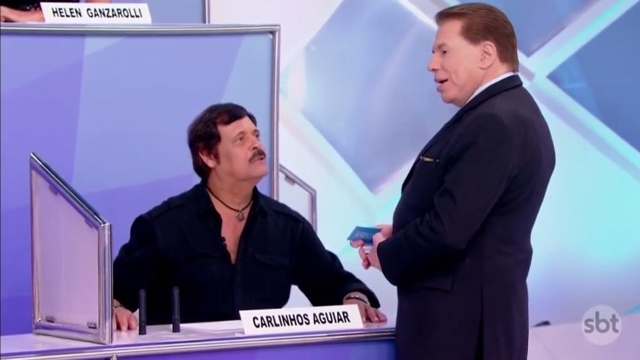 Carlinhos Aguiar conversa com Silvio Santos no "Jogo dos Pontinhos" - Reprodução/SBT