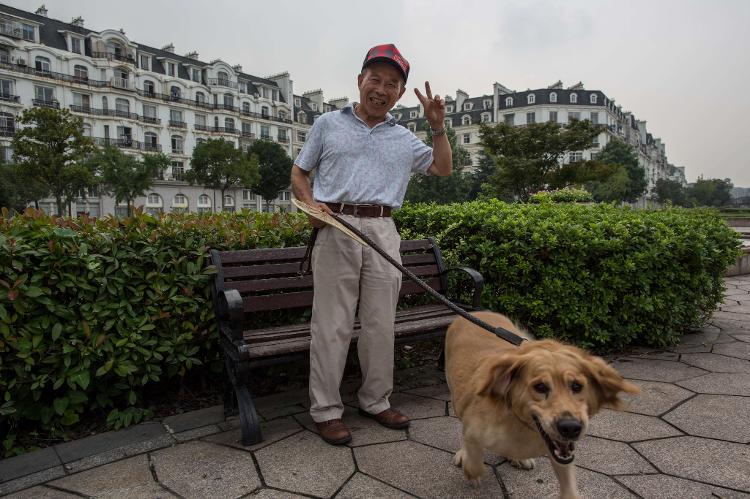 Resident of Tianducheng, a Chinese community inspired by Paris, France - Guillaume Payen/LightRocket via Getty Images - Guillaume Payen/LightRocket via Getty Images