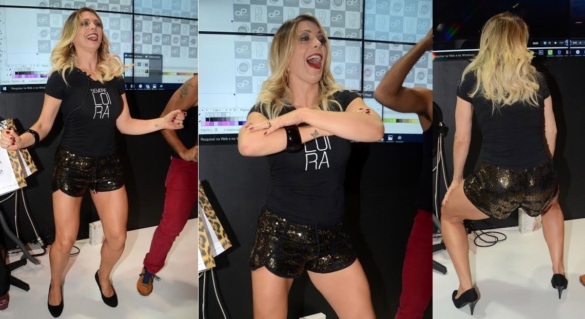 18.abr.2016- Sheila Mello relembra tempos de loira do Tchan em feira de beleza de São Paulo. A dançarina requebrou e dançou até o chão - Eduardo Martins / Agnews