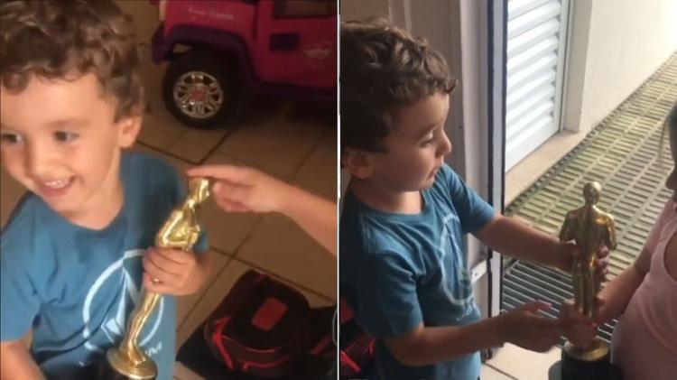 Filho de Patrícia Abravanel segura o Troféu Imprensa que a mãe ganhou - Reprodução/Instagram - Reprodução/Instagram