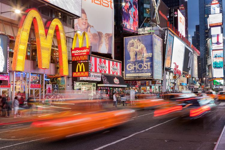 Times Square, in New York City, where fast food restaurants compete for space with shops and cultural attractions - ShutterWorx / Getty Images - ShutterWorx / Getty Images