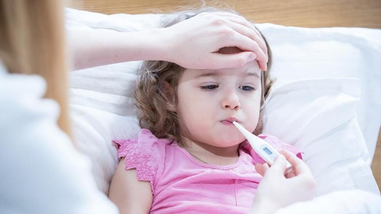 A child with a fever - iStock - iStock