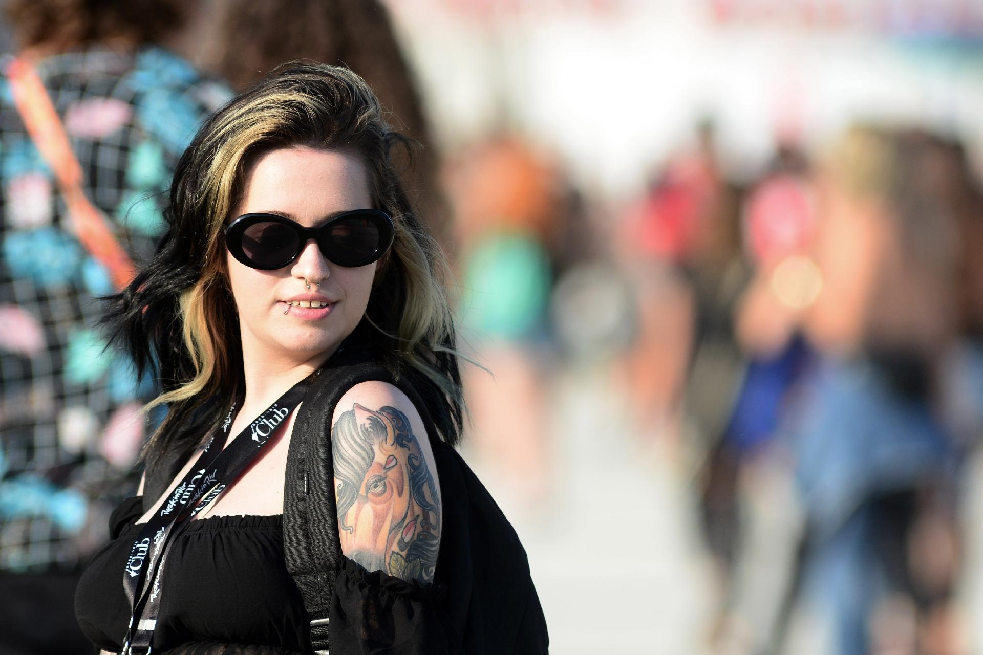 Jovem exibe tatuagem no braço no primeiro dia da segunda semana do Rock in Rio - Wallace Teixeira /Futura Press/Estadão Conteúdo