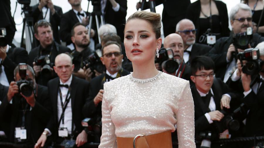  Amber Heard está sendo processada por difamação pelo seu ex, Johnny Depp - Reuters