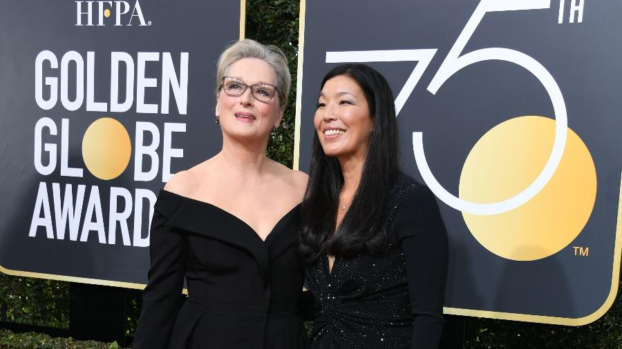Meryl Streep vai ao Globo de Ouro 2018 ao lado de Ai-jen Poo, líder da organização National Domestic Workers Alliance - AFP