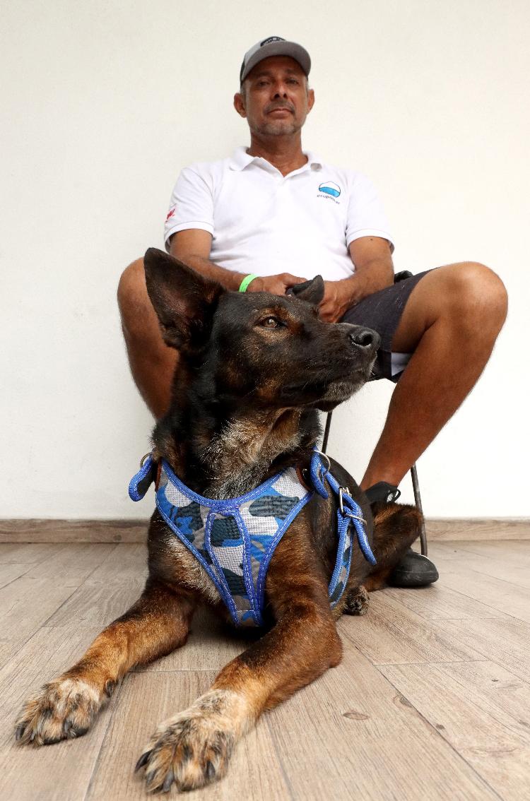 Mexican fisherman Genaro Rosales with Bella - Ulysse Rose/AFP - Ulysse Rose/AFP