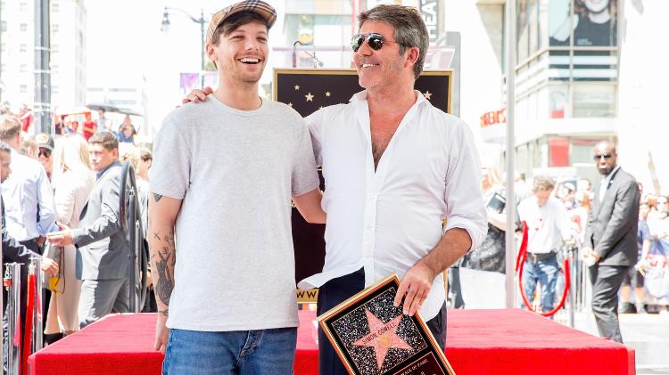 Louis Tomlinson, do One Direction, comparece a homenagem a Simon Cowell - Rich Fury/Getty Images/AFP - Rich Fury/Getty Images/AFP