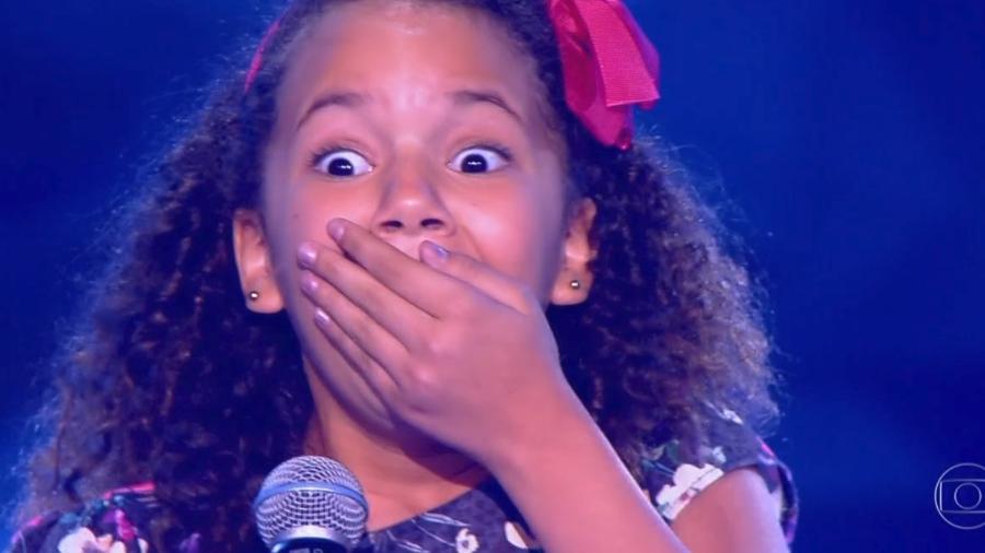 Ana Julia levou um usto ao ser escolhida para entrar no "The Voice Kids" - Reprodução/TV Globo