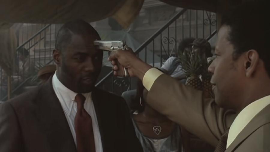 Idris Elba em cena com Denzel Washington em "O Gângster" - Reprodução/Universal Pictures