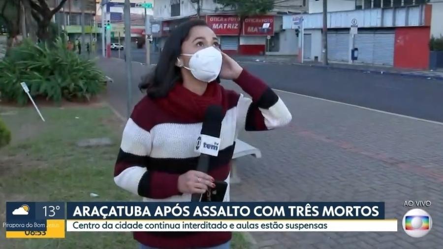 Repórter Thaís Gomes se assustou com barulho de explosão em Araçatuba ao vivo - Reprodução/TV Globo
