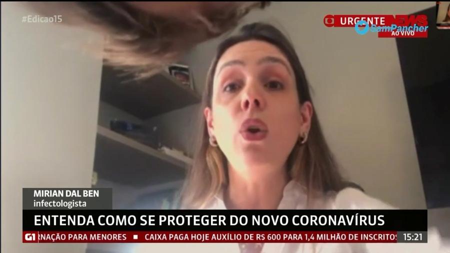 Filho sobe em móvel enquanto mãe discute pandemia na GloboNews - Reprodução/GloboNews