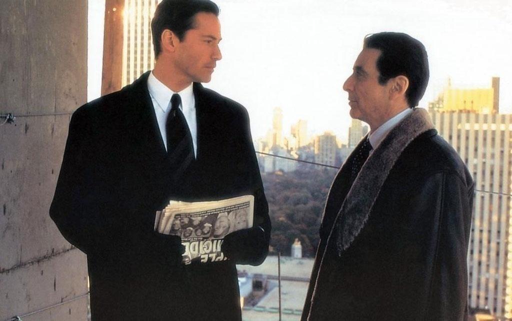 Al Pacino e Keanu Reeves em cena de "Advogado do Diabo" (1997) - Divulgação
