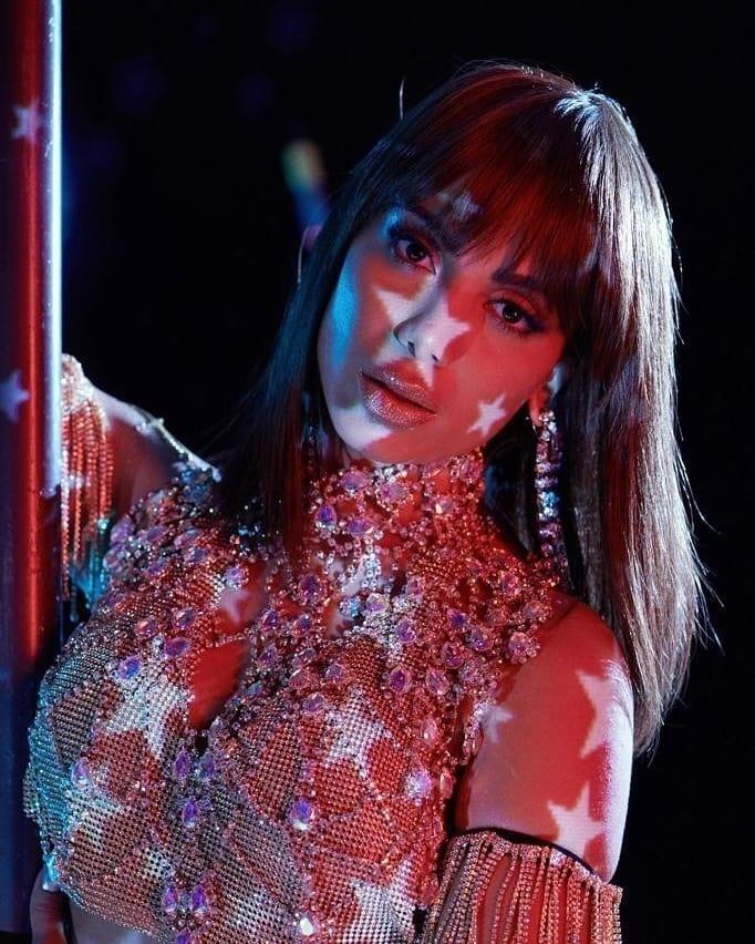 Faixa 5 - "Poquito" - Divulgação