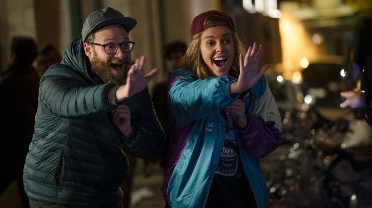 Seth Rogen e Charlize Theron em cena de Casal Improvável - Divulgação - Divulgação